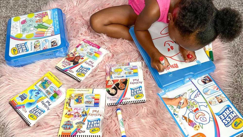 Young girl coloring with Color Wonder
