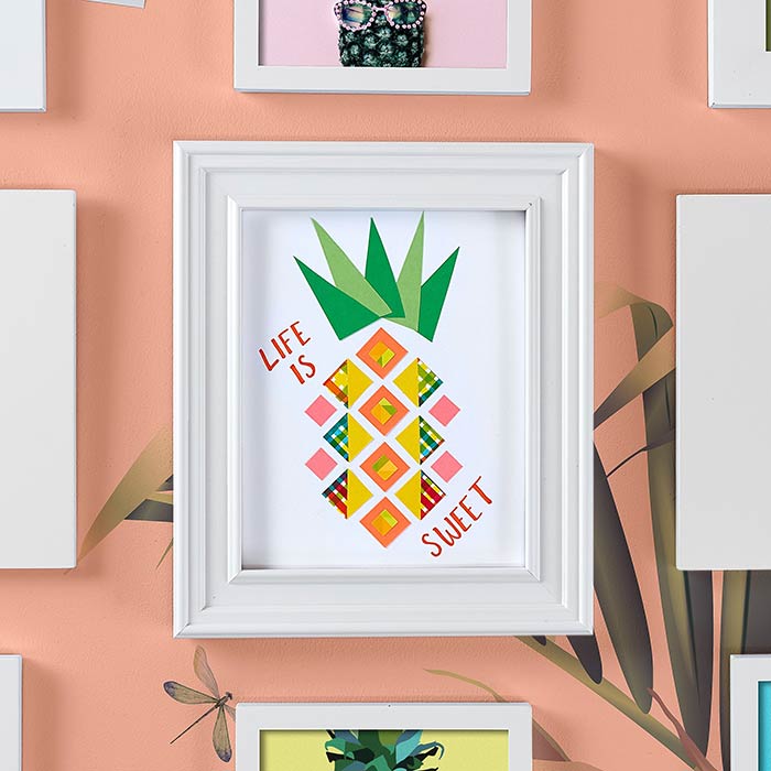 pineapple canvas art craft. front view in a frame.